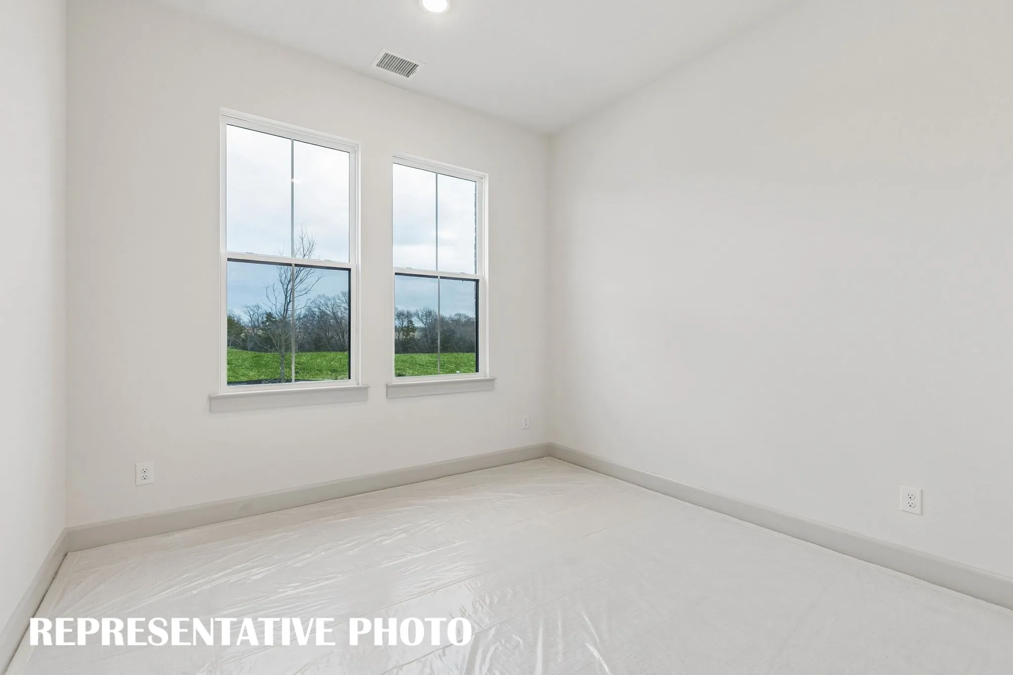 You'll enjoy nicely sized secondary bedrooms in our lovely Toulouse II plan.  REPRESENTATIVE PHOTO