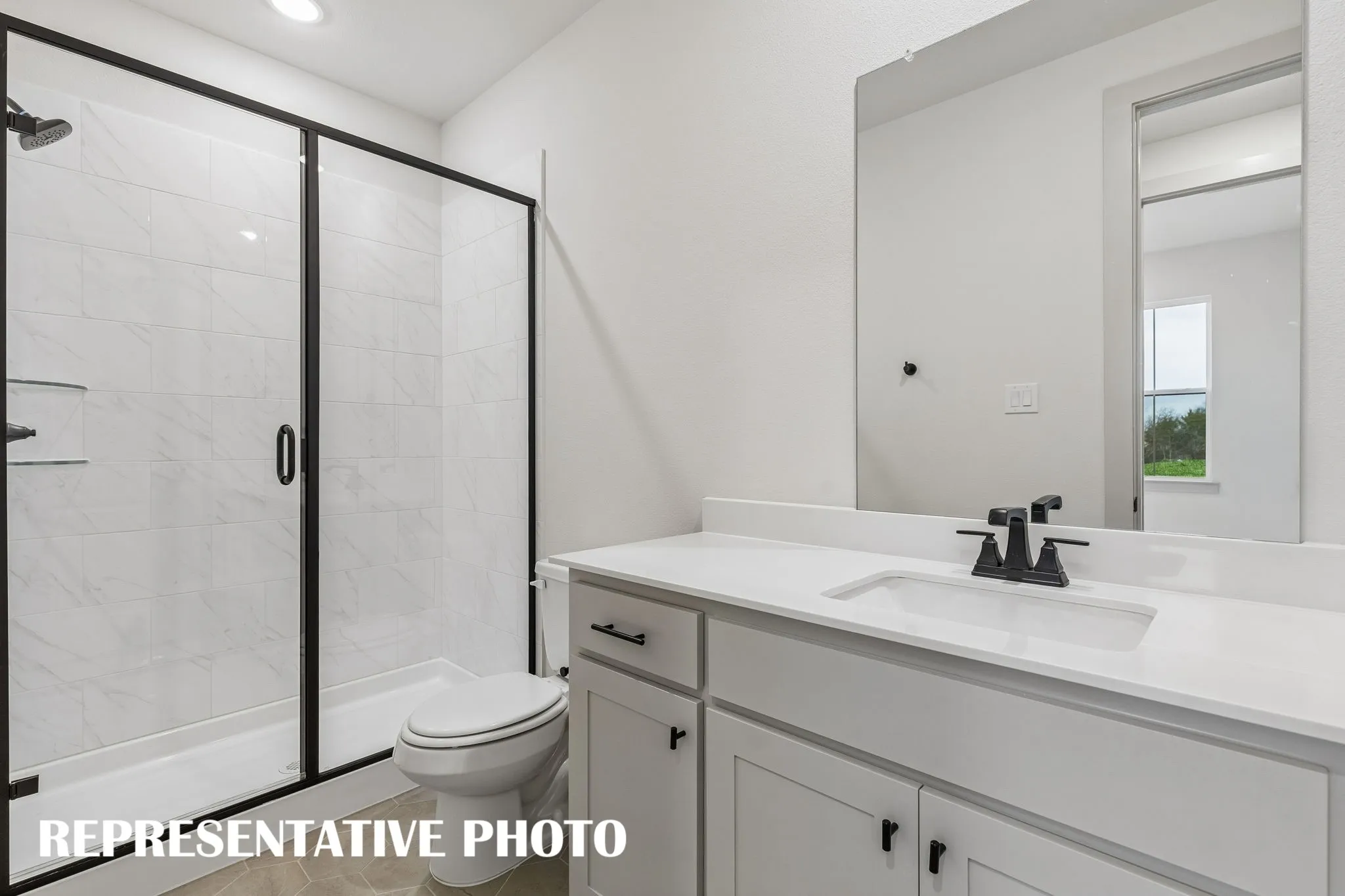 Friends and family will feel right at home in any of the beautifully finished guest baths.  REPRESENTATIVE PHOTO