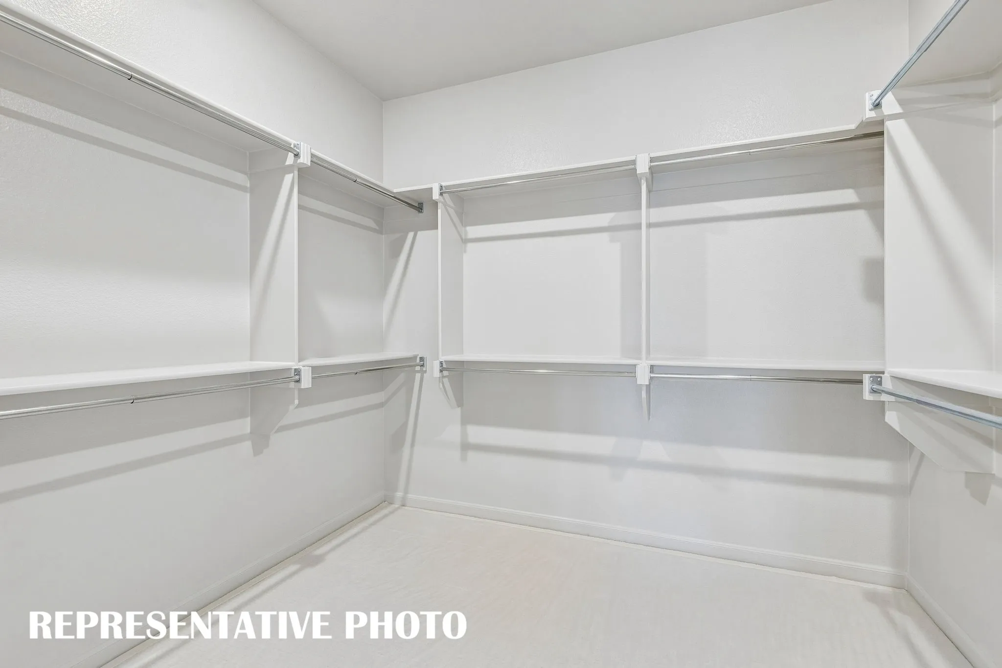 No fighting over space in this wonderful owner's closet!  REPRESENTATIVE PHOTO