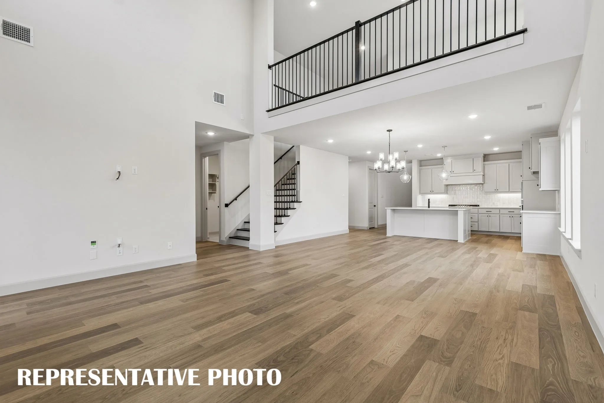 Whether it's lively gatherings or cozy family get togethers, this open concept design fits all occasions!  REPRESENTATIVE PHOTO