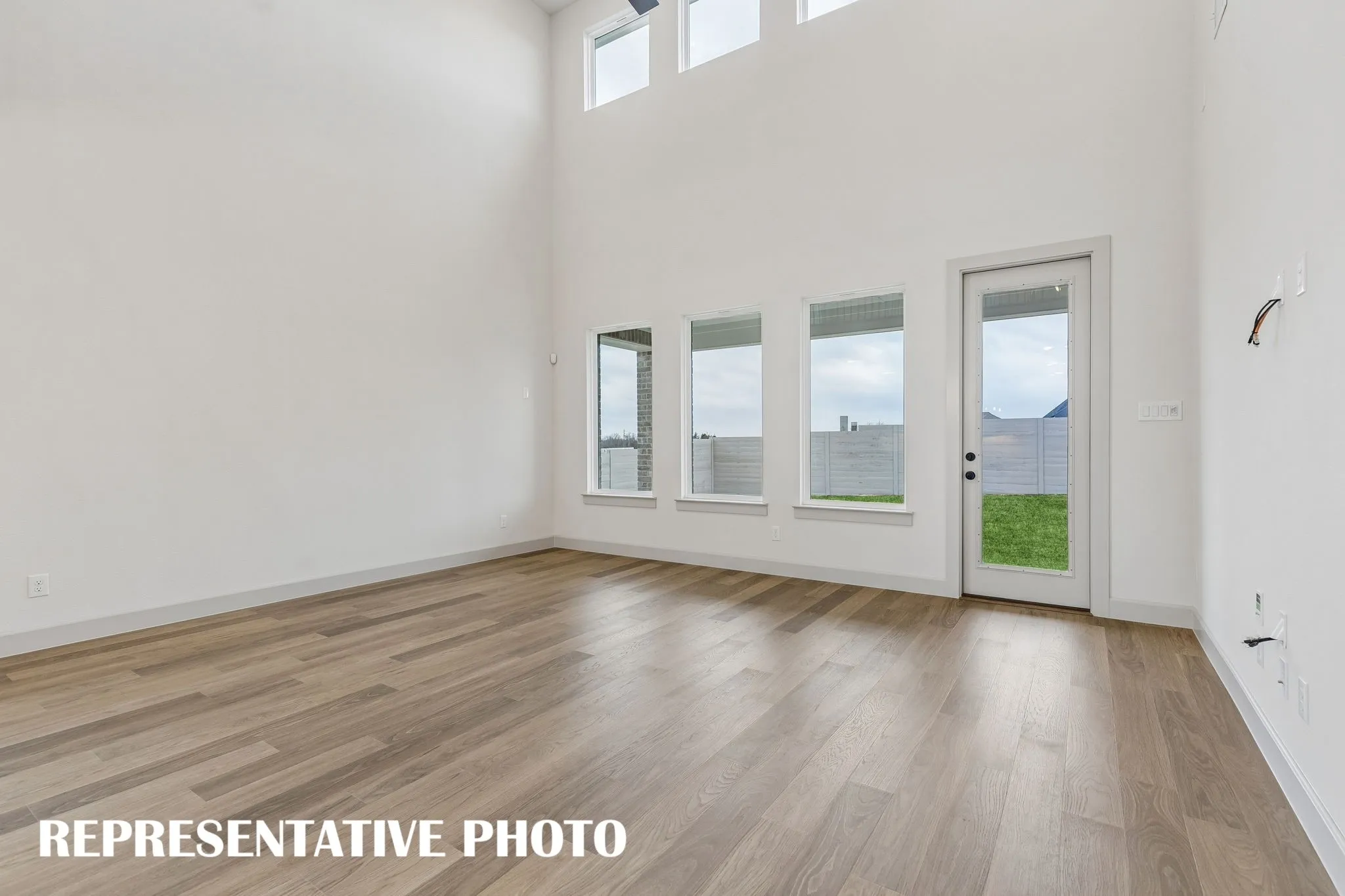 Light, bright and airy, the entire family will love this wonderful family room!  RPERESENTATIVE PHOTO