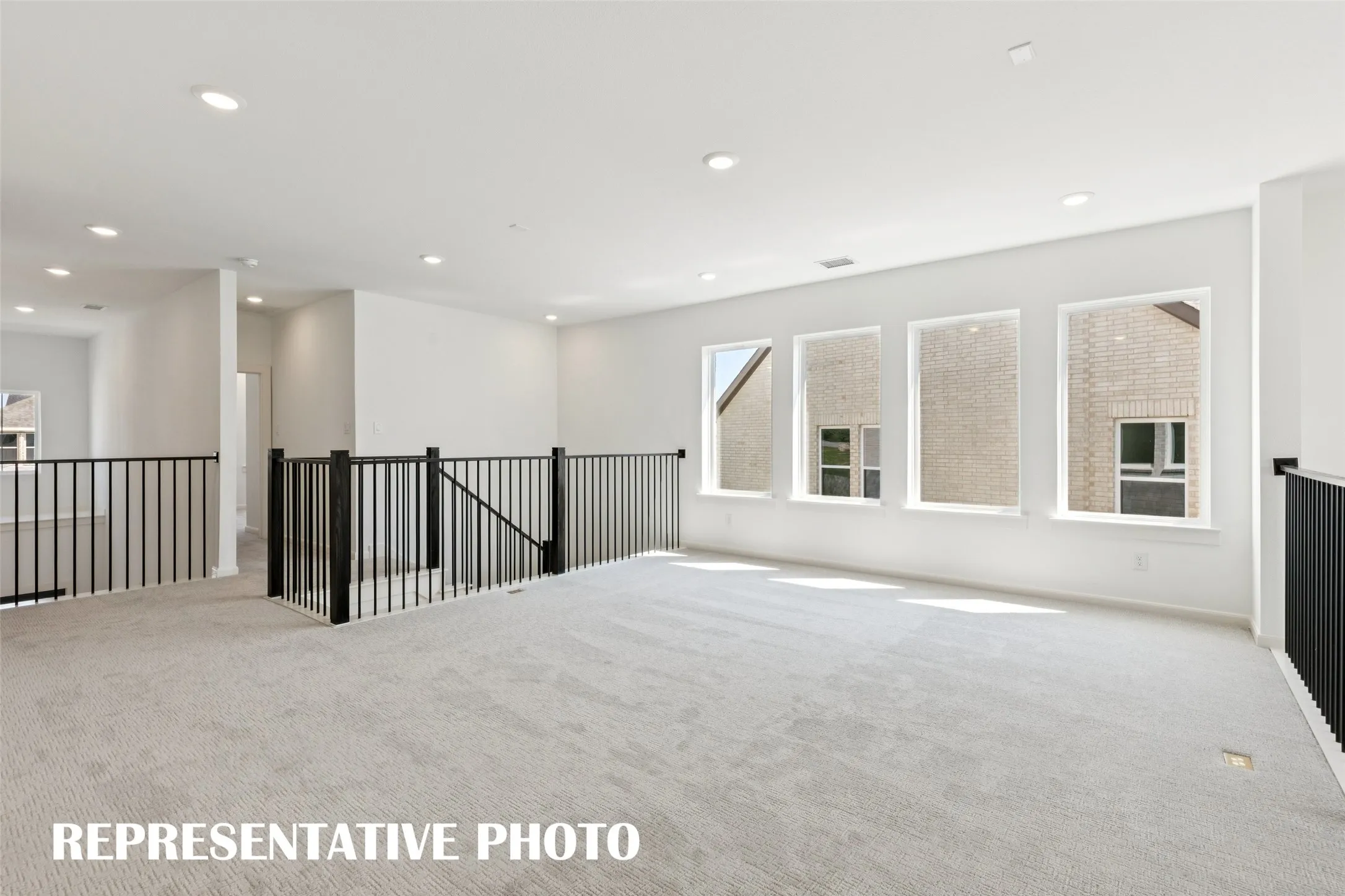 Spacious and bright, this game room offers endless family fun time!  REPRESENTATIVE PHOTO