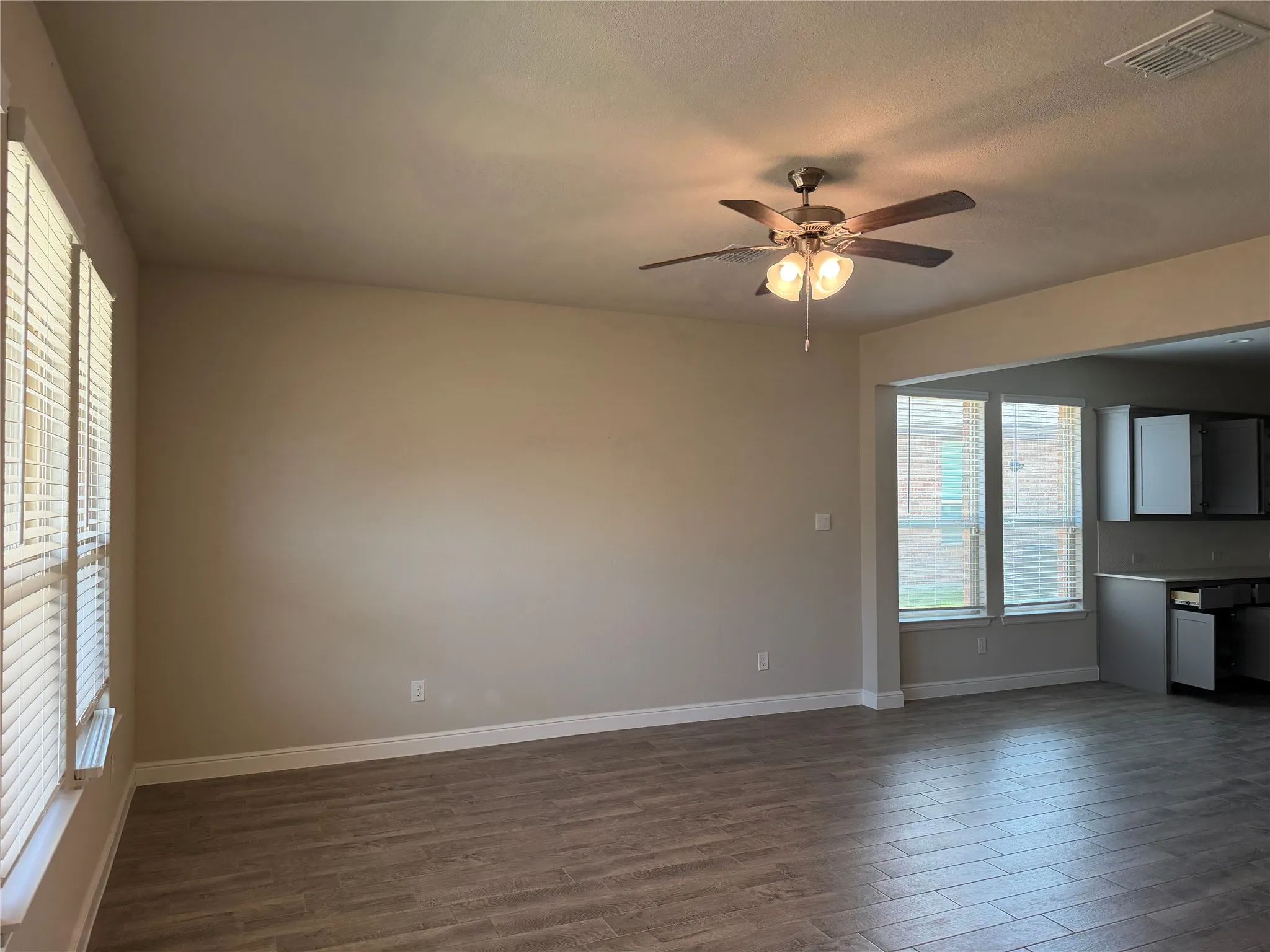 Recessed ceiling with an integrated ceiling fan and light fixture