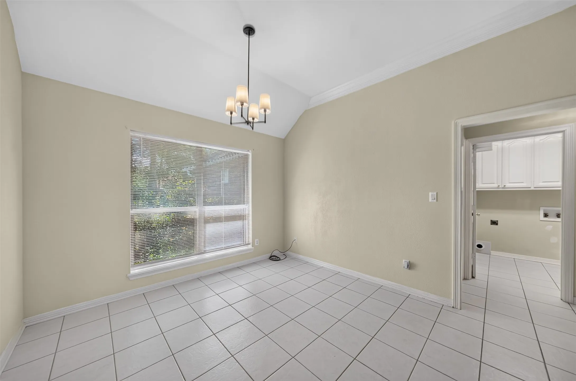 Breakfast area featuring the large window overlooking the BackYard