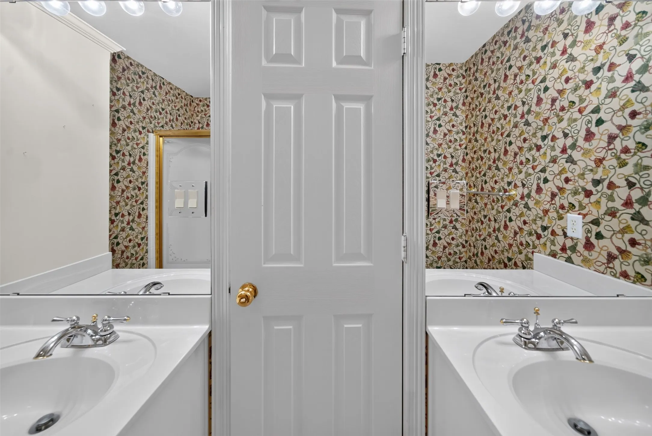 View of Extra Bath off of the Hallway and three other bedrooms