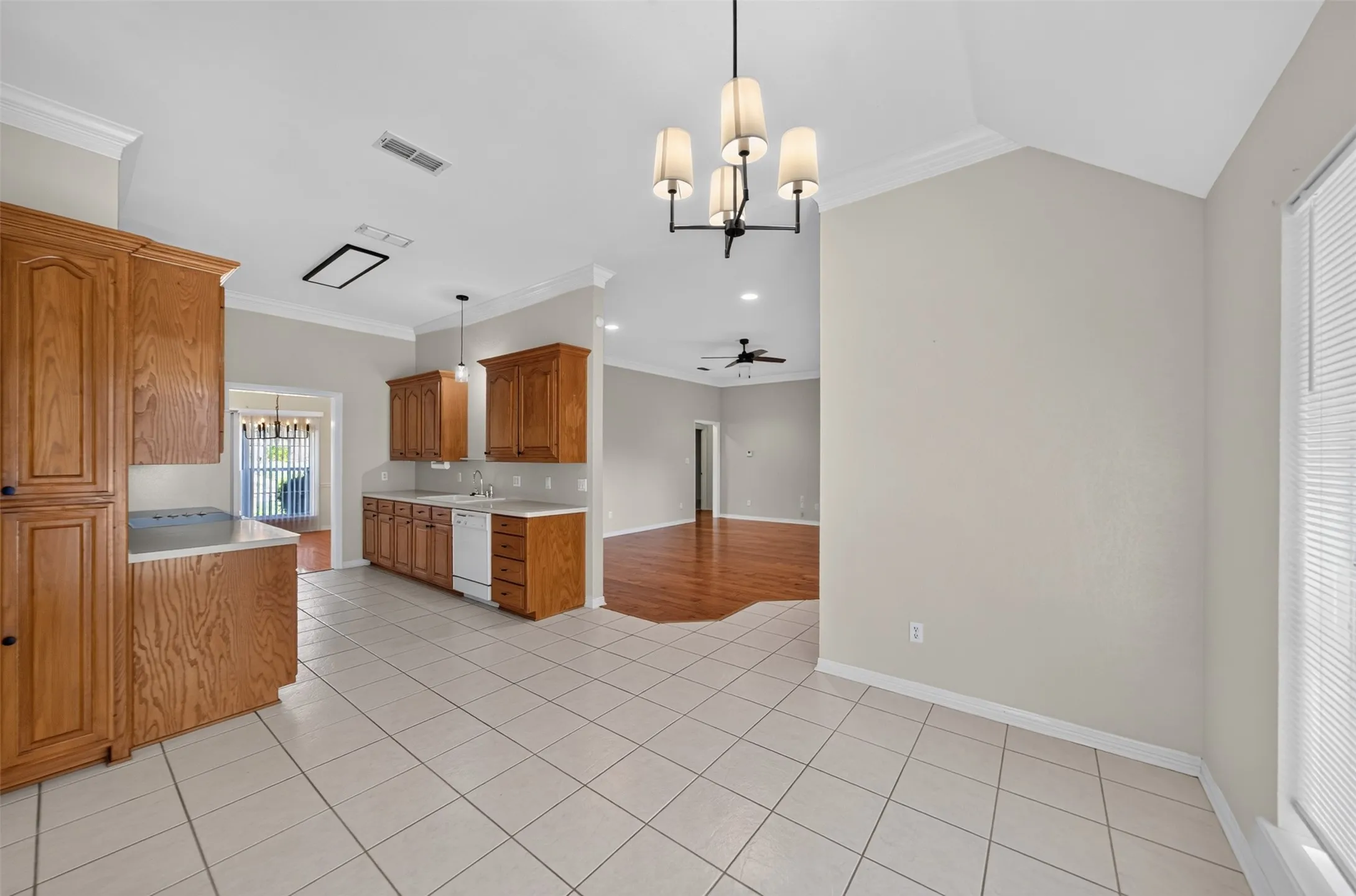 View of the Breakfast Area Looking toward the kitchen and Living Area.  You can also see the entrance into the Formal Dining.