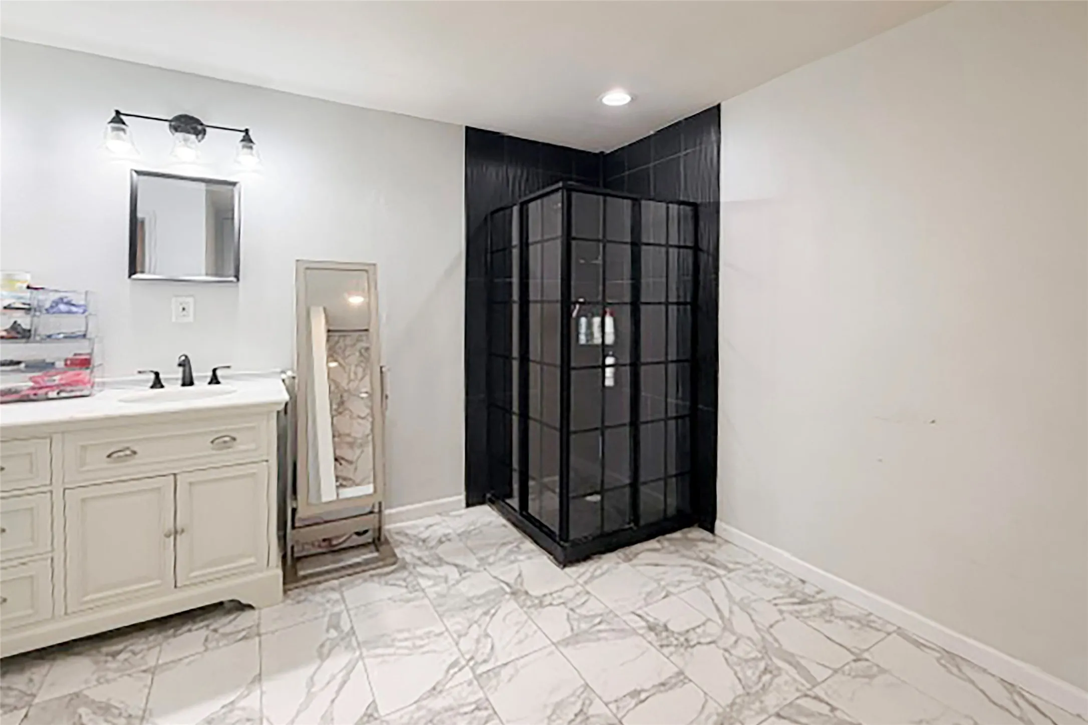 Master bathroom with split sink.