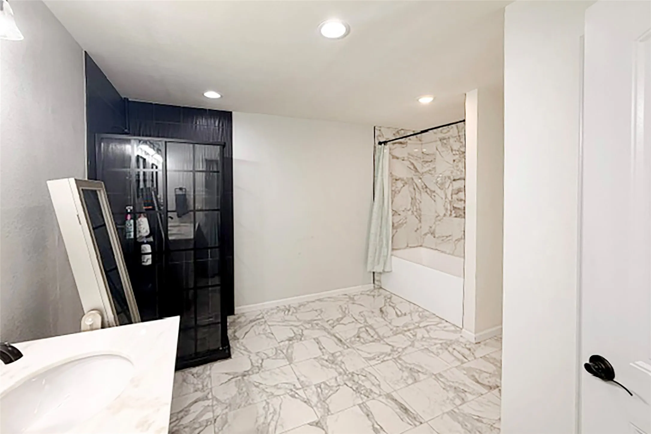 Master bathroom with bathtub and stand alone shower