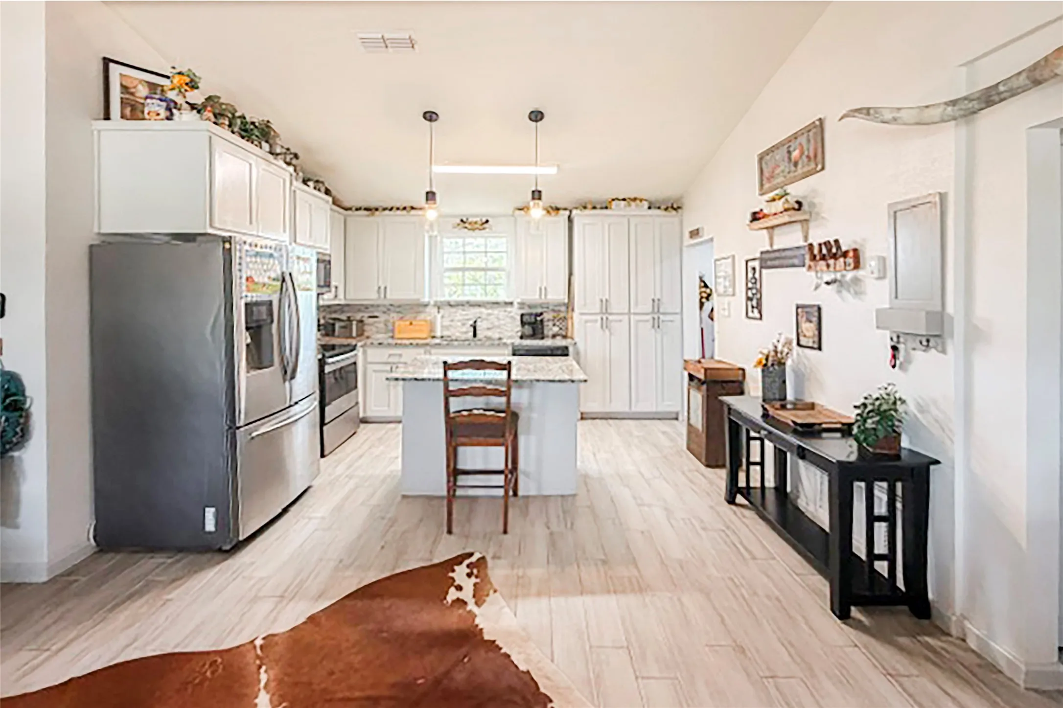 Updated appliances, countertops, and cabinets.