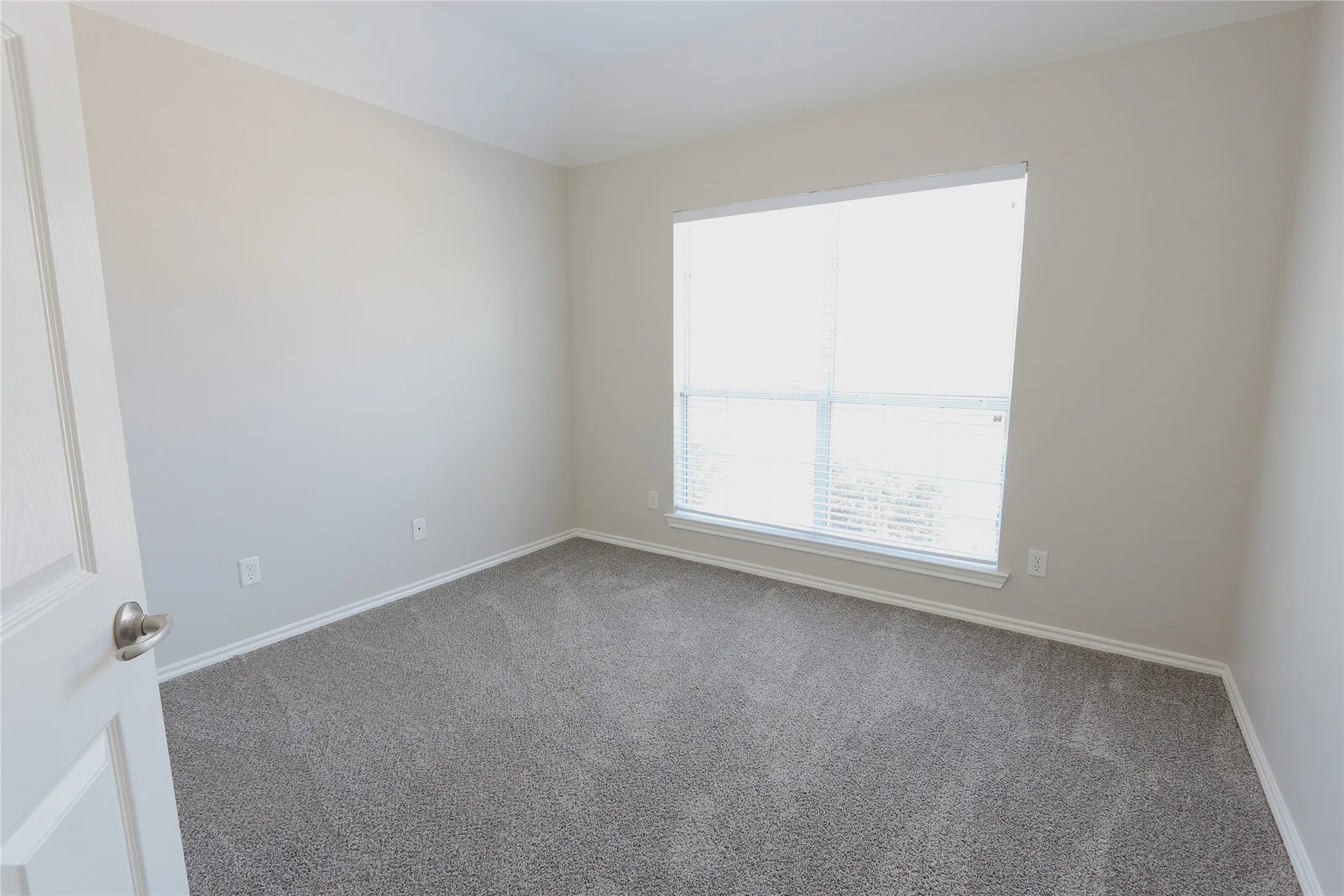 2nd Bedroom with new carpet.