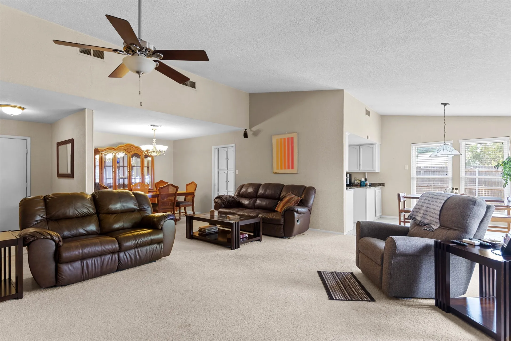 Open concept living and dining areas.