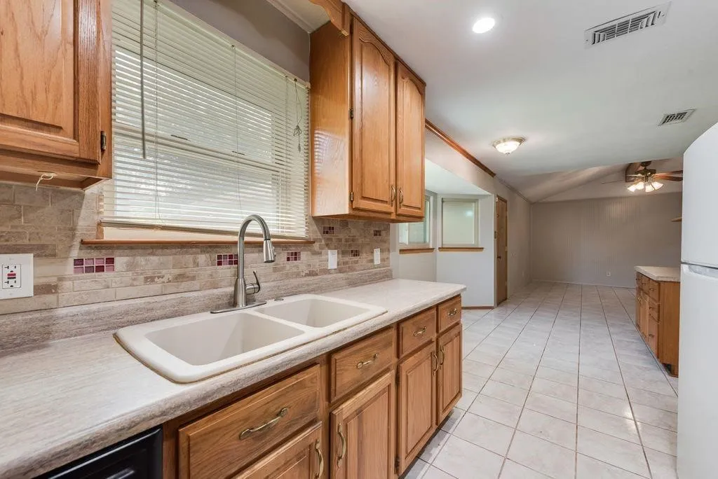 ANOTHER VIEW OF THE KITCHEN