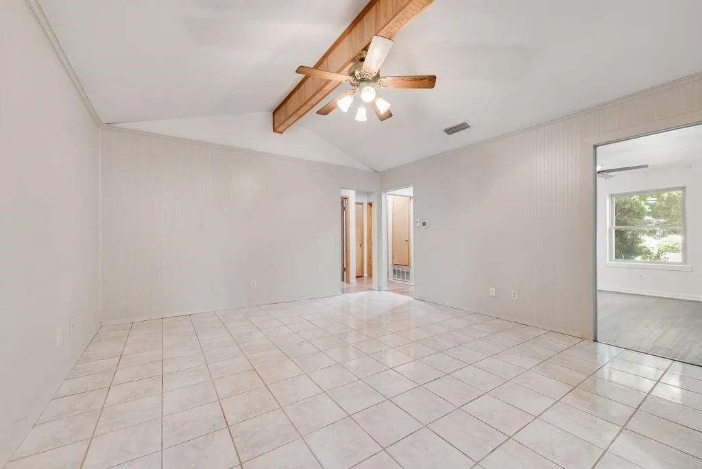 ANOTHER VIEW OF THE LIVING ROOM