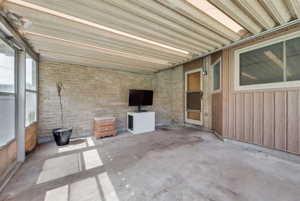 ANOTHER VIEW OF THE COVERED PATIO-SUNROOM
