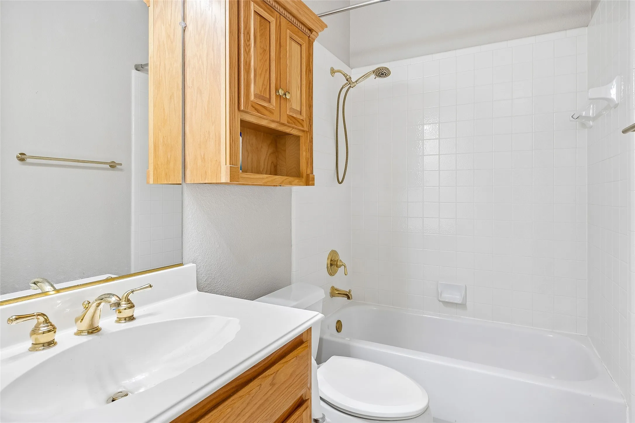 Bathroom with full size tub and extra cabinets