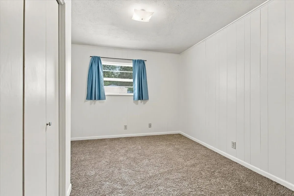 Bedroom #2, new carpet, large window for plenty of natural sunlight