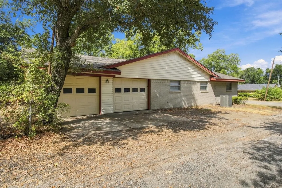 Side view of home with oversized 2 car garage