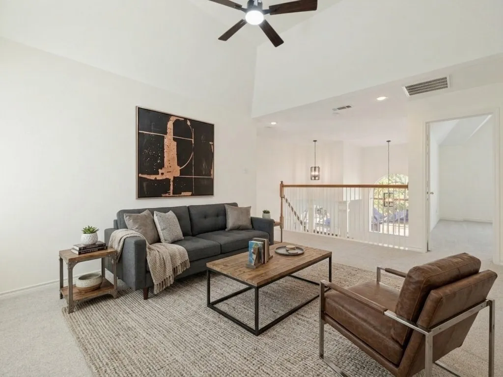 Game room with virtually staged furniture.