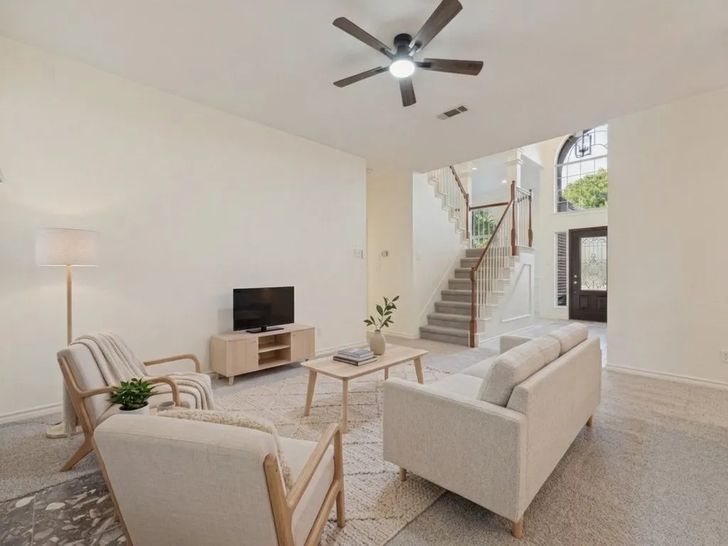 Living room with virtually staged furniture.