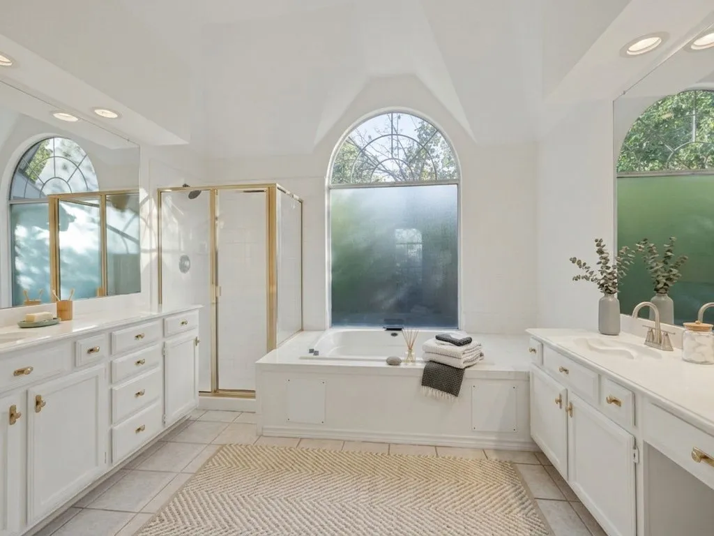 Primary bathroom with virtually staged decor