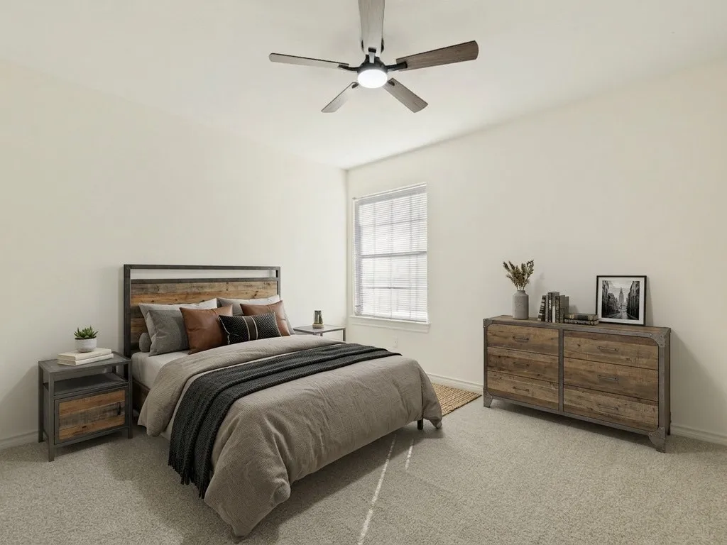Bedroom 3 with virtually staged furniture.