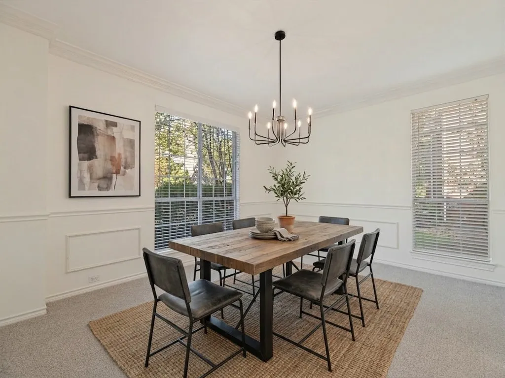 Dining Area  with virtually staged furniture.