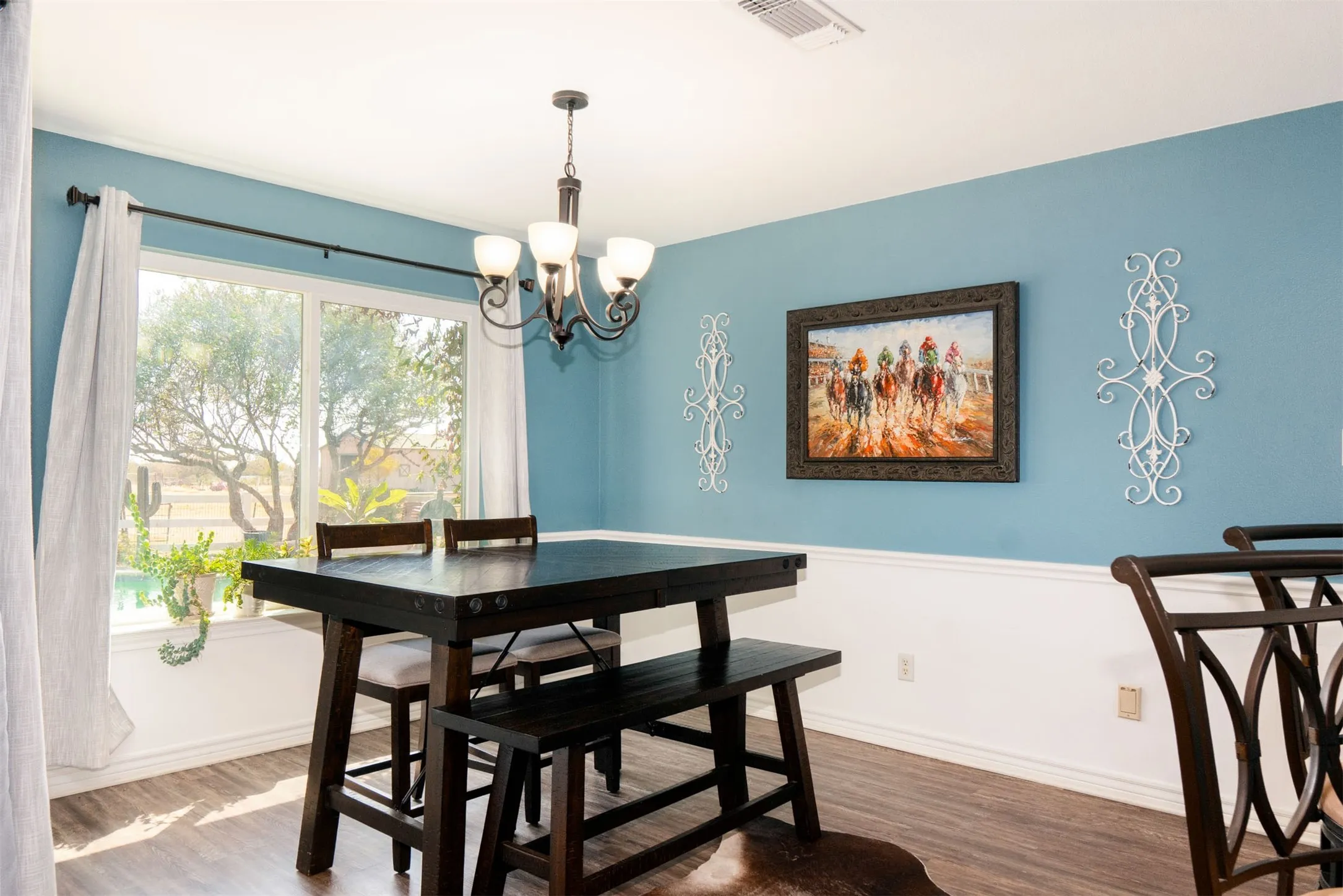 Dining area looking over the backyard and pool.