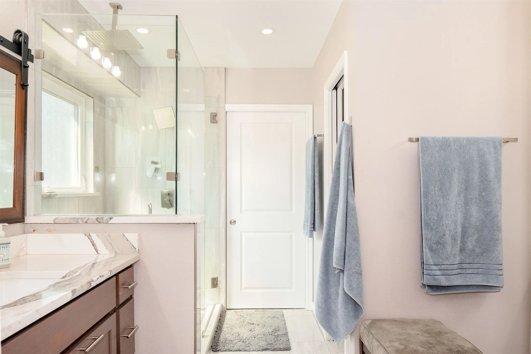Separate sinks in master bathroom.