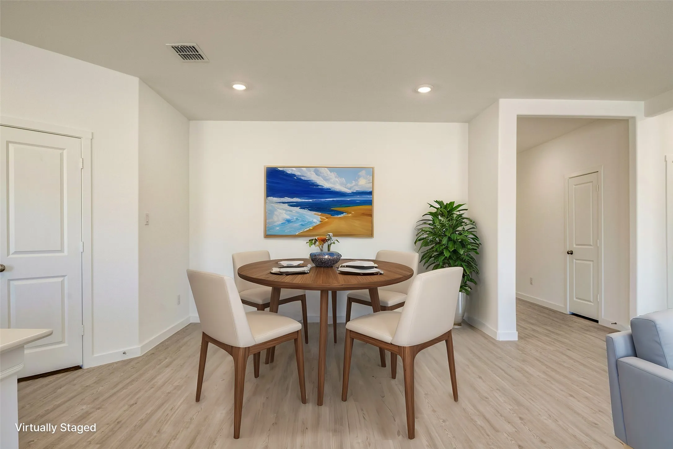 Virtually staged to show how this space works perfectly for a dining room....