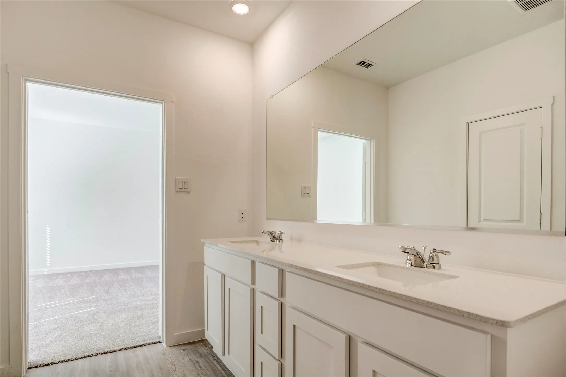 View into the primary from the bathroom....