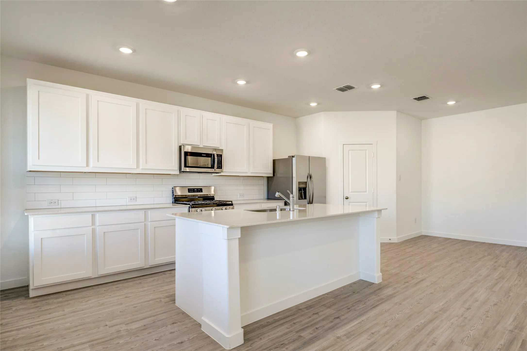 Perfect layout looking onto the living room off the dining room....