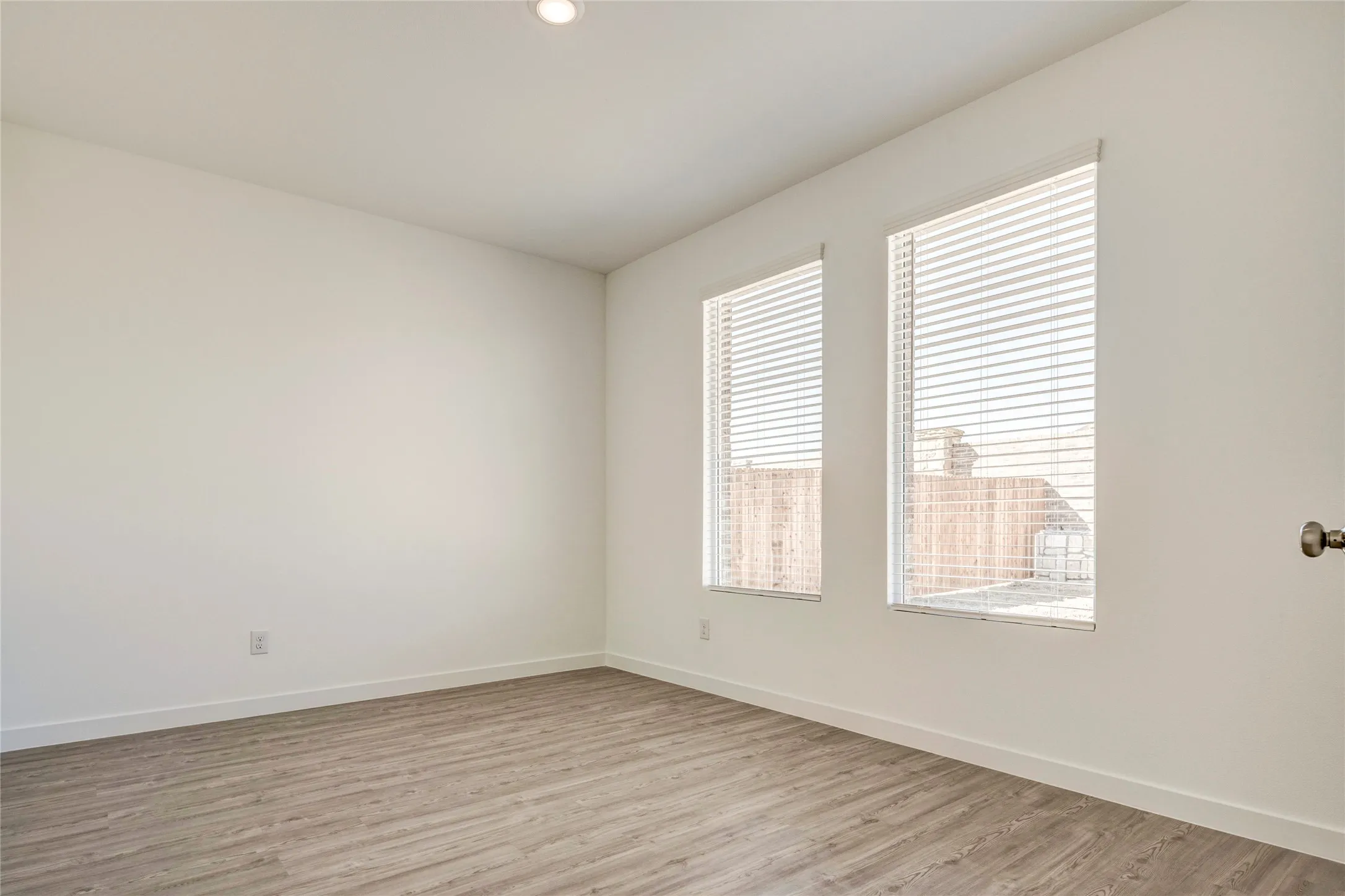 This amazing flex room that looks onto the back yard can be a media room, office, workout room etc.