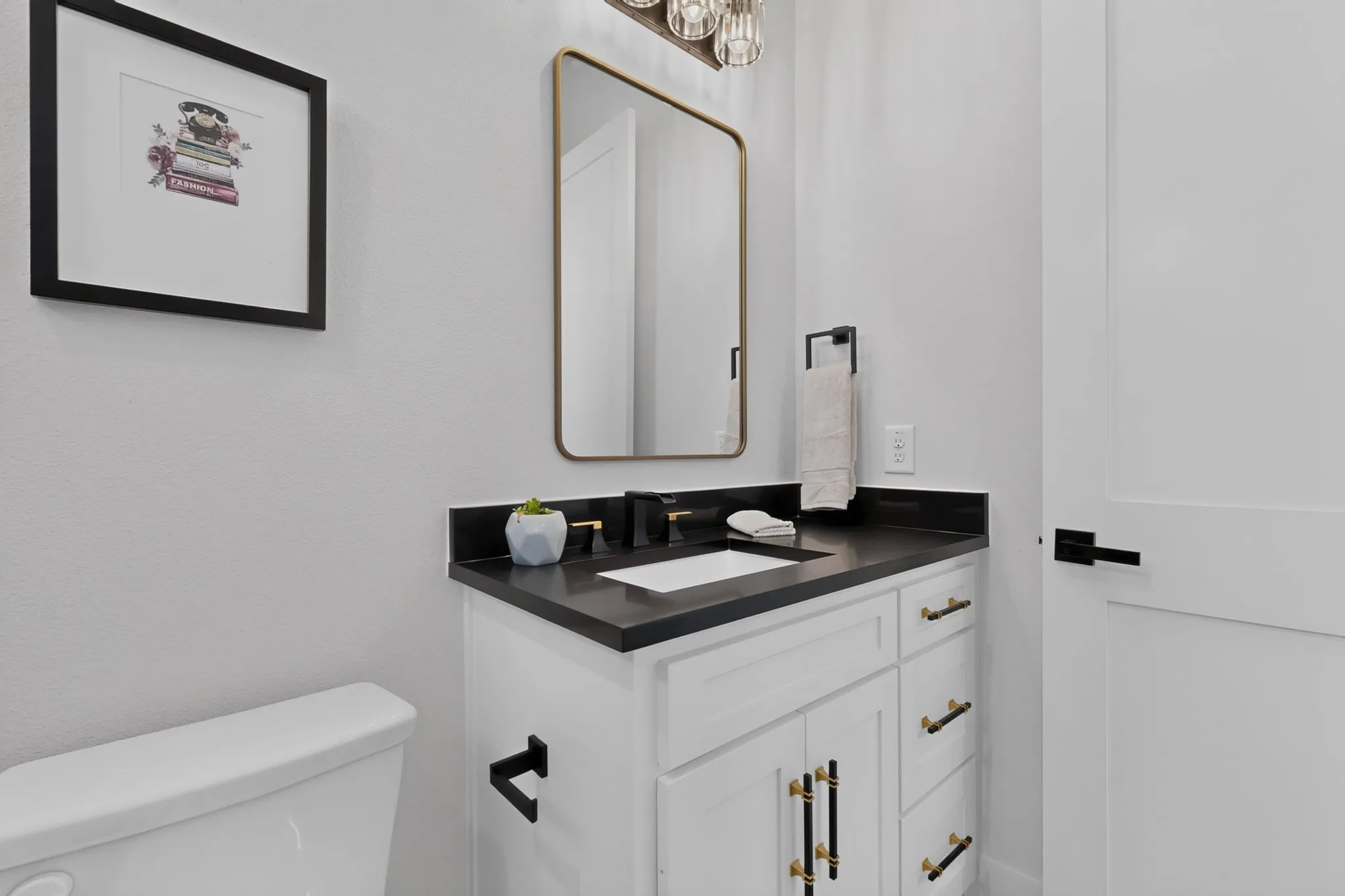 Vanity with a beautiful black countertop