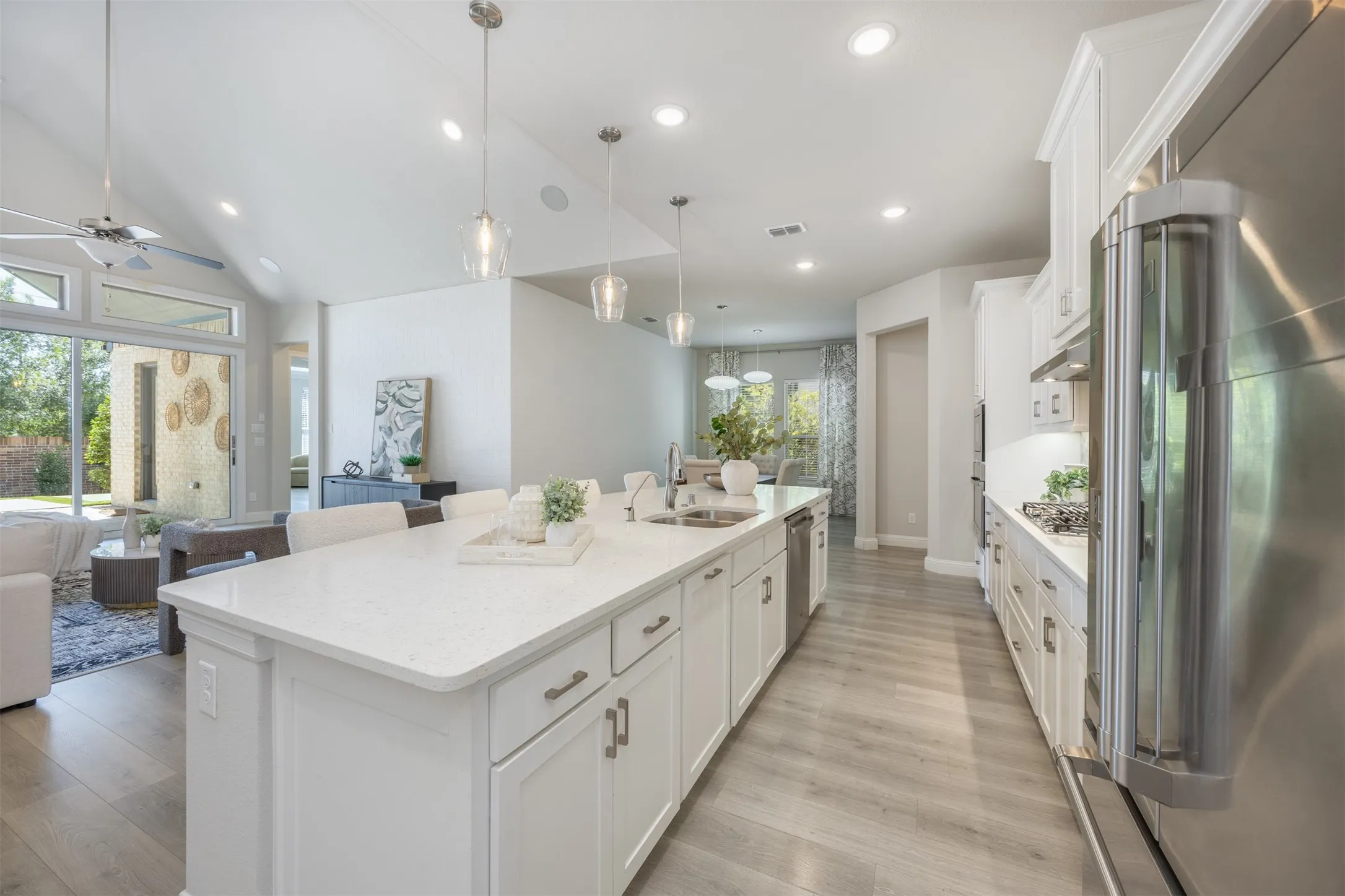 The kitchen is open to the family room and dining room