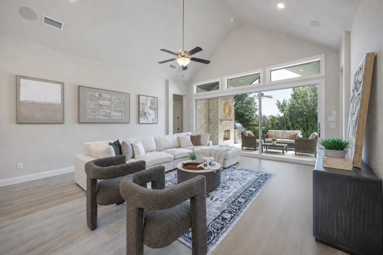 Open living area with multi-slide doors bringing the outdoors in.