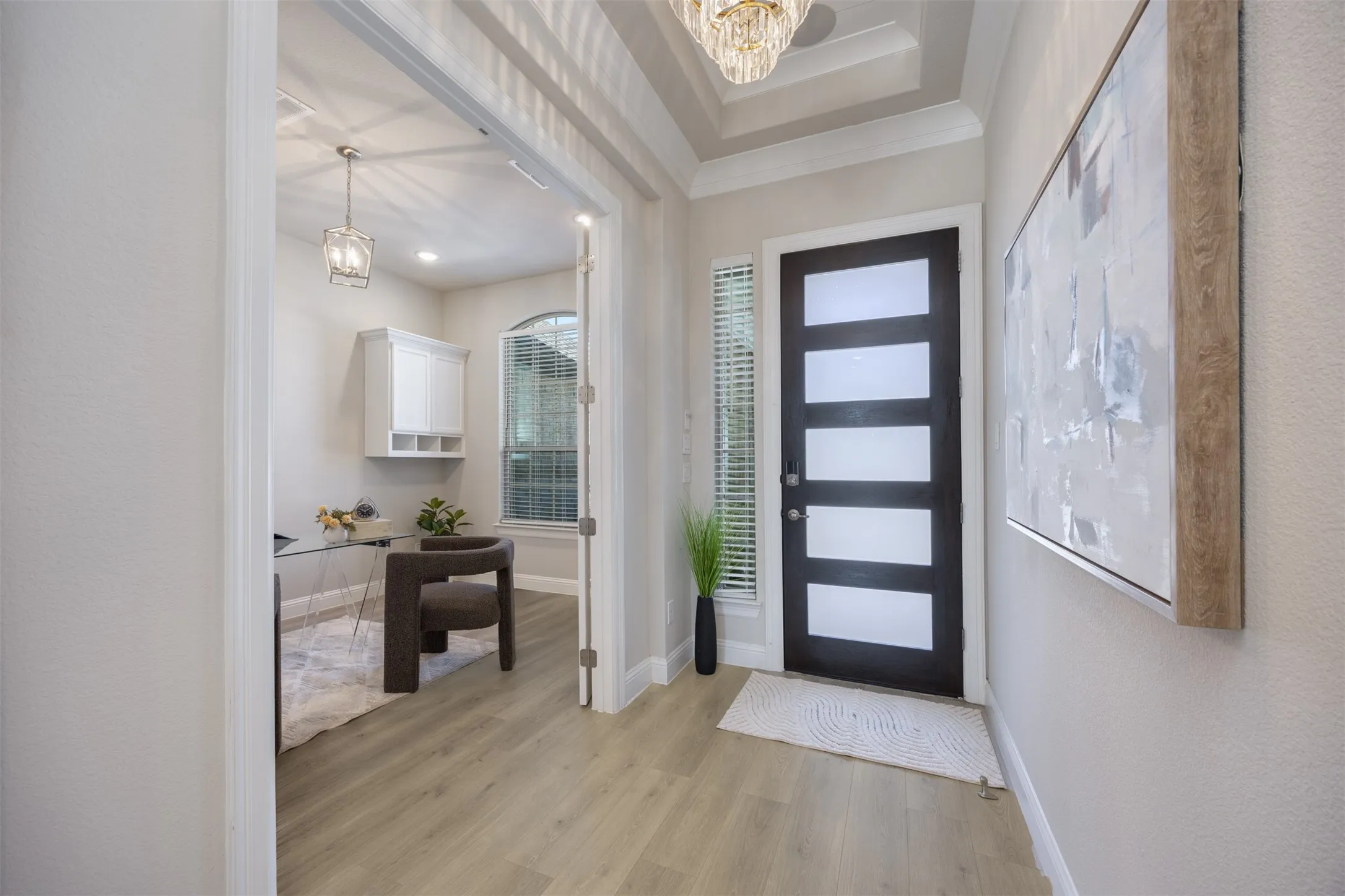 The study is located just off of the entry and has French doors for privacy