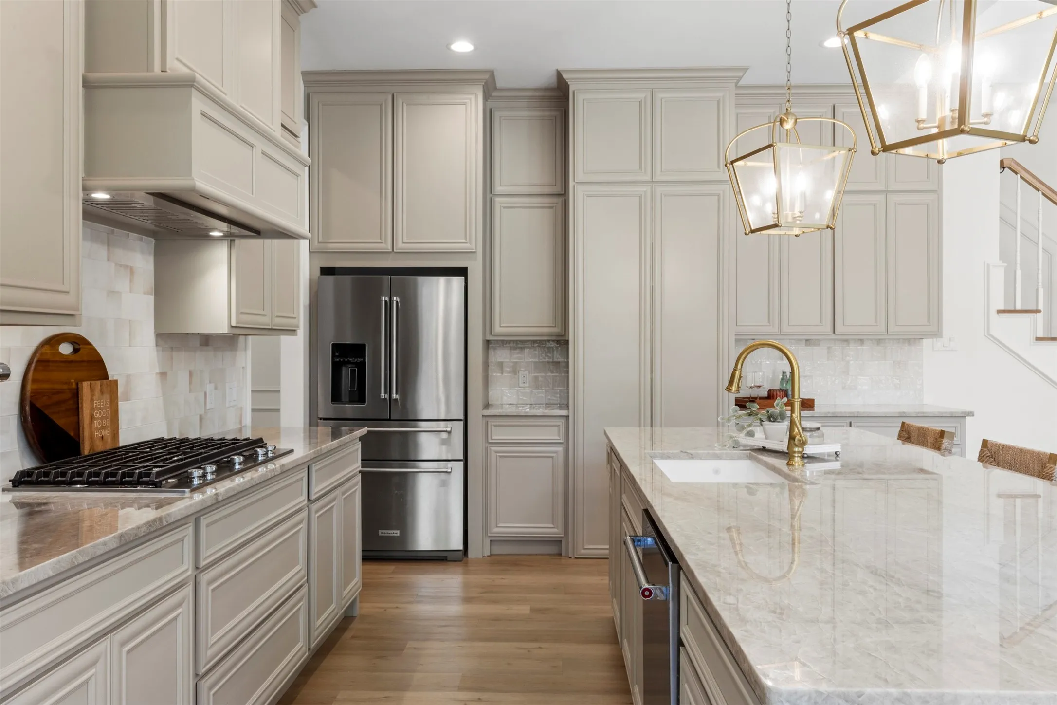Gas range and huge walk in pantry through the double cabinet doors