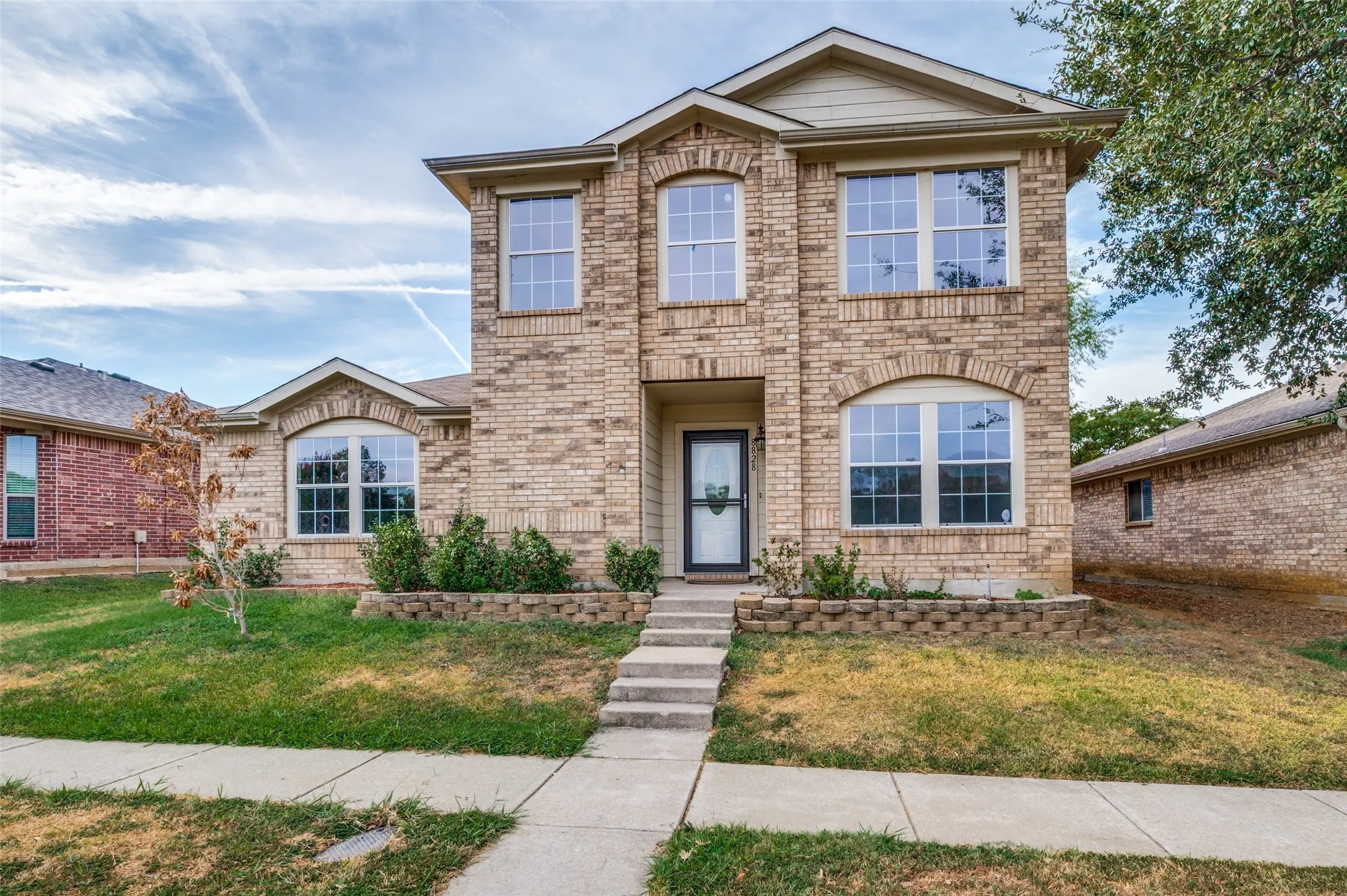 Brick exterior with arched window details