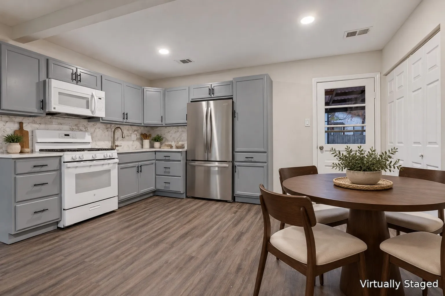 Kitchen featuring gray cabinetry, white countertops, white range, wood-finish flooring, and recessed lighting