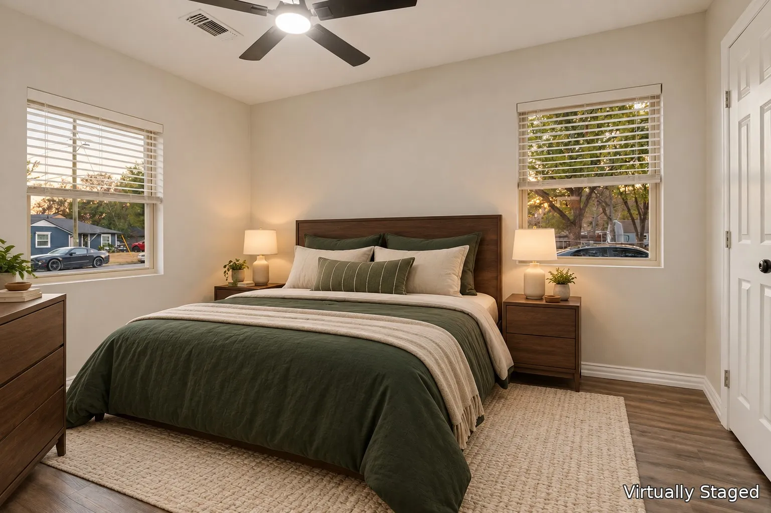 Wood-finish flooring with a ceiling fan light fixture