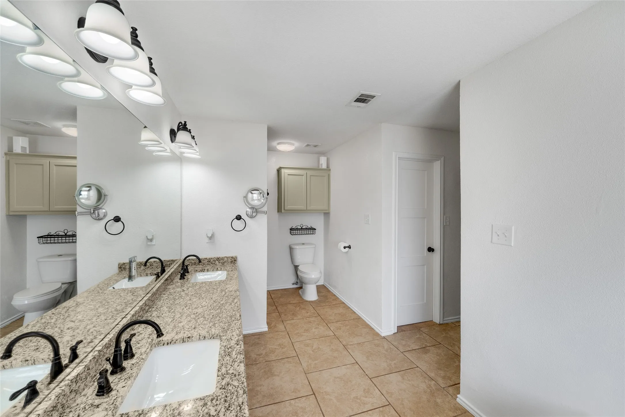 Dual vanity with granite-style countertop and integrated sinks