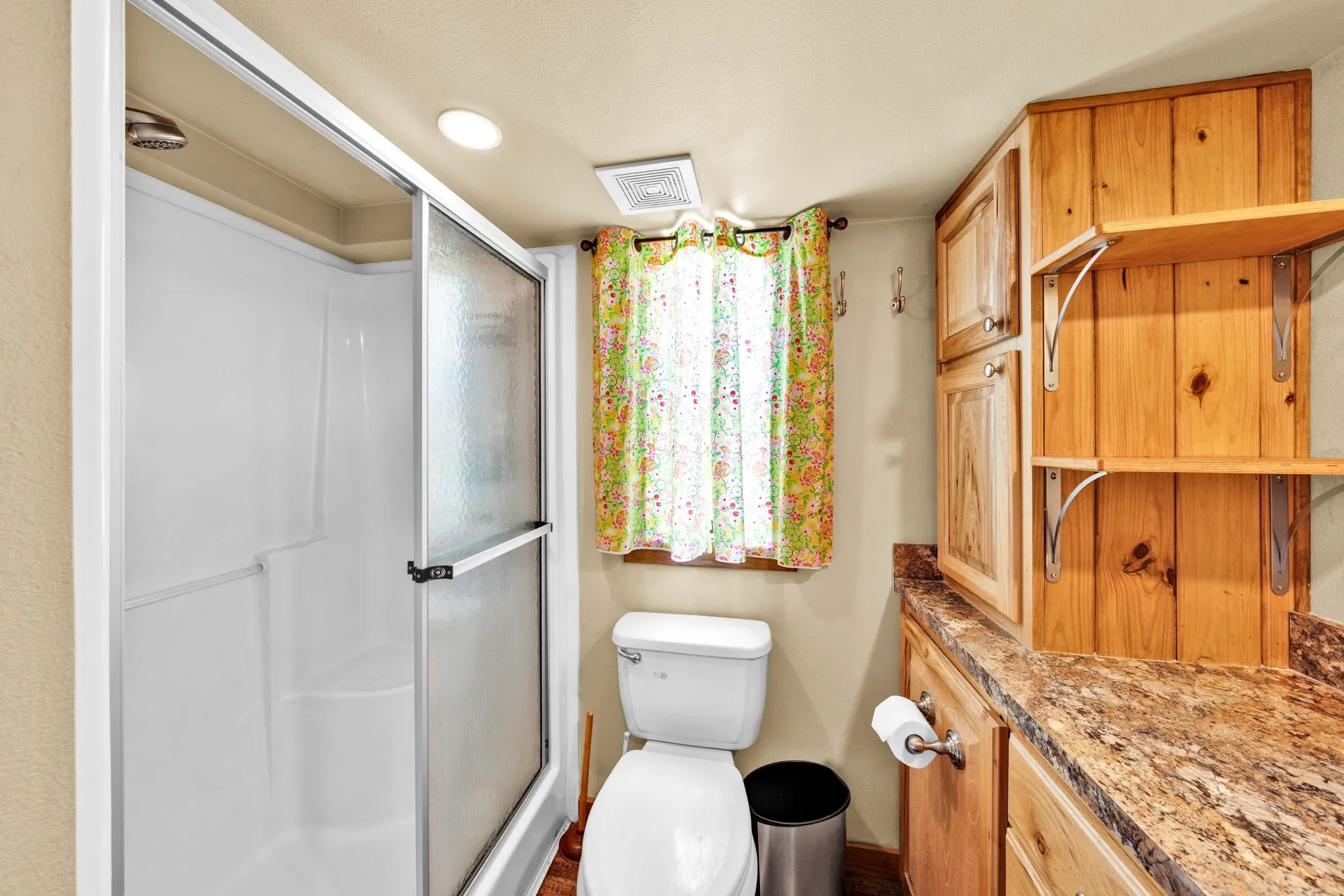 Shower enclosure with sliding frosted glass doors