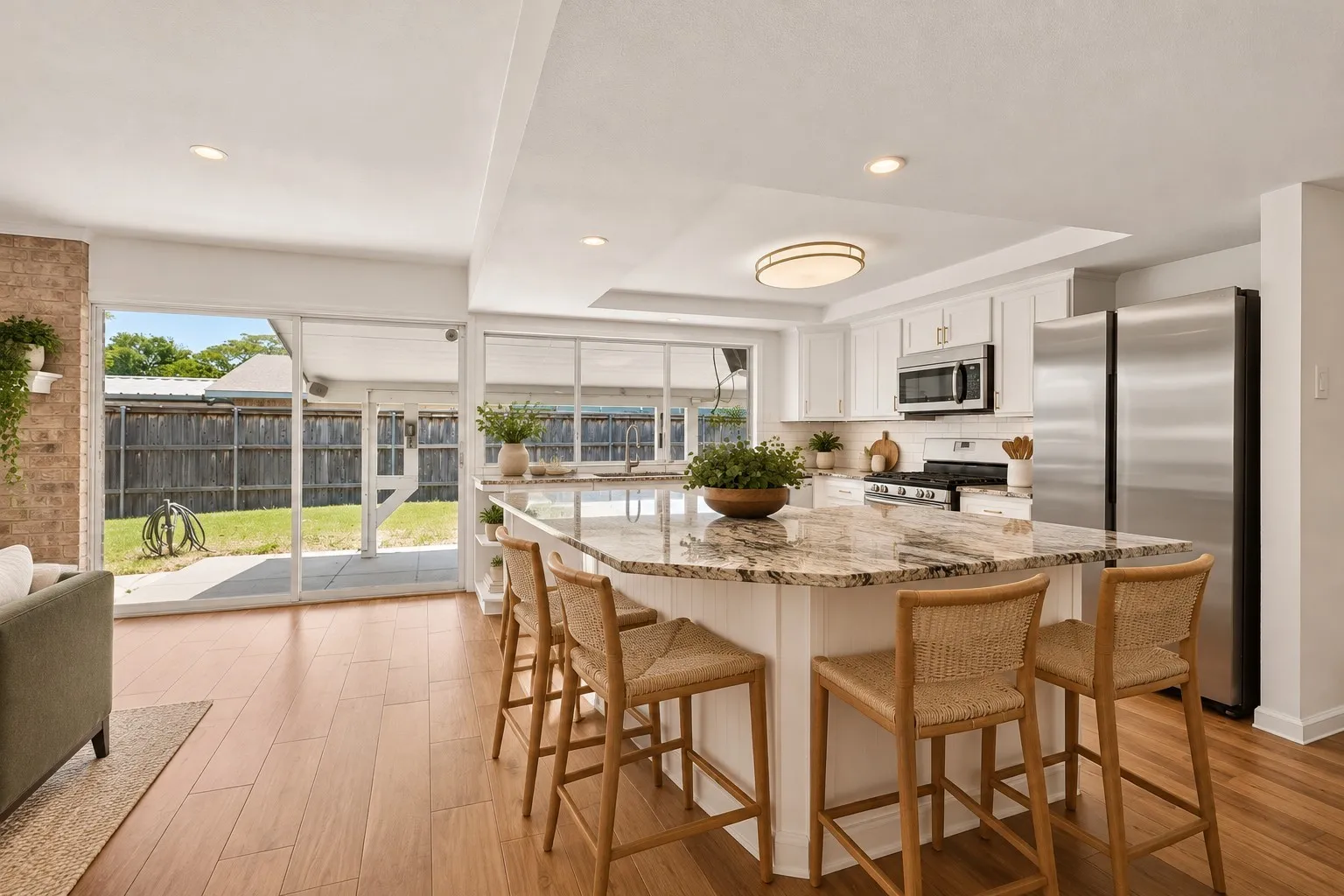 Enhanced photo of kitchen with gorgeous island, plenty of seating space