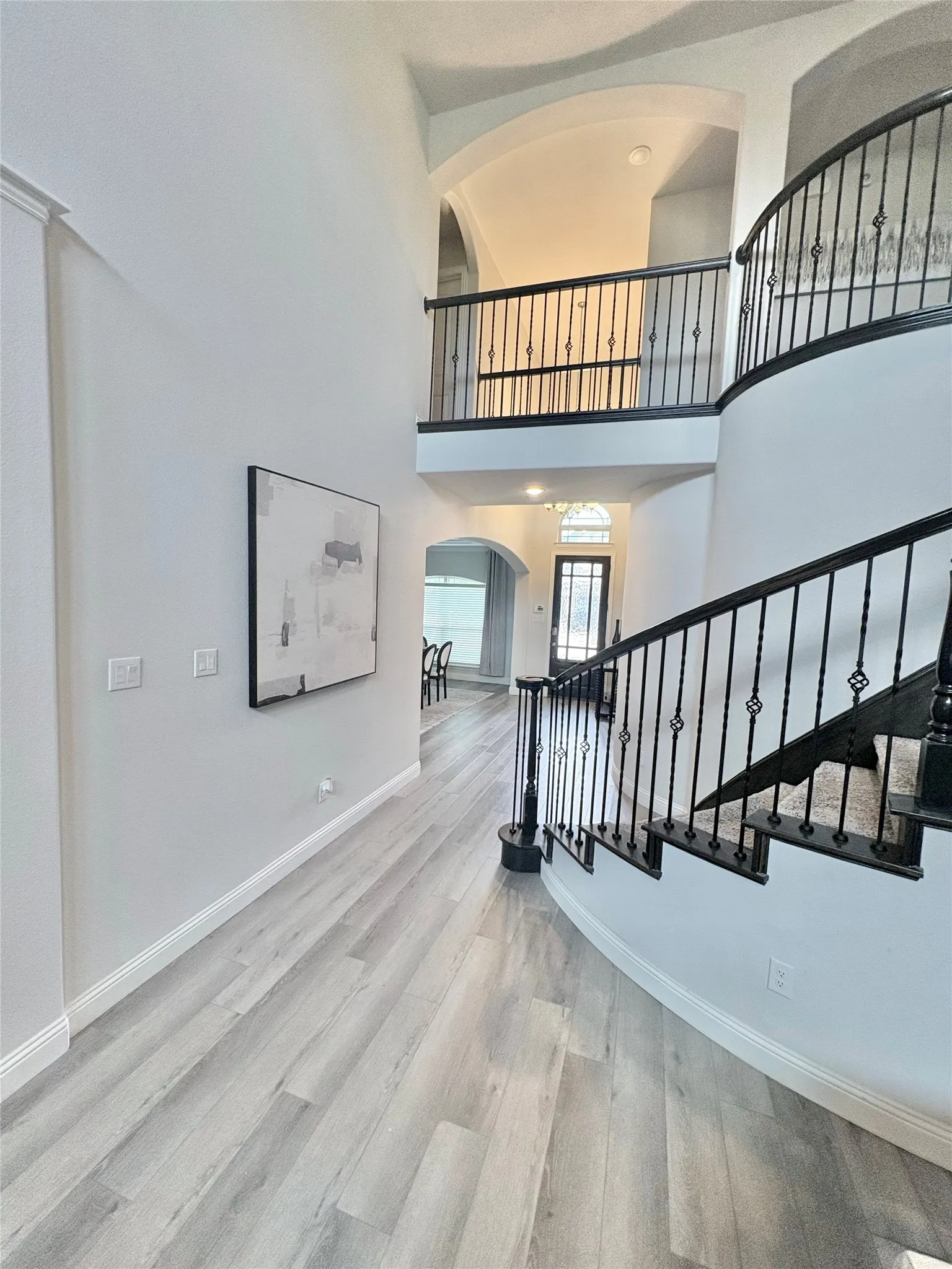 Soaring ceilings with arch details