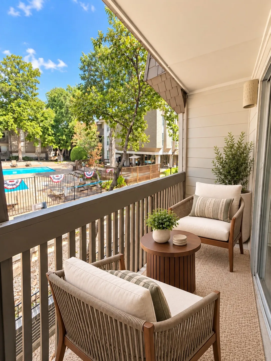Virtually staged. Covered balcony overlooking the pool.