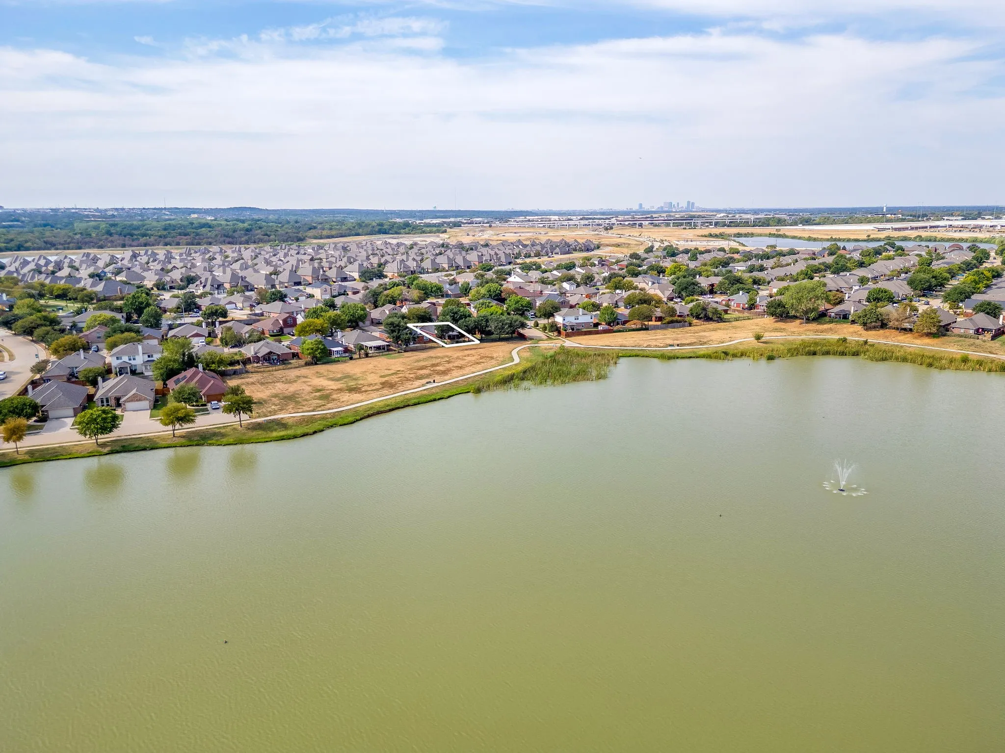 Drone view of the Fort Worth skyline in the background