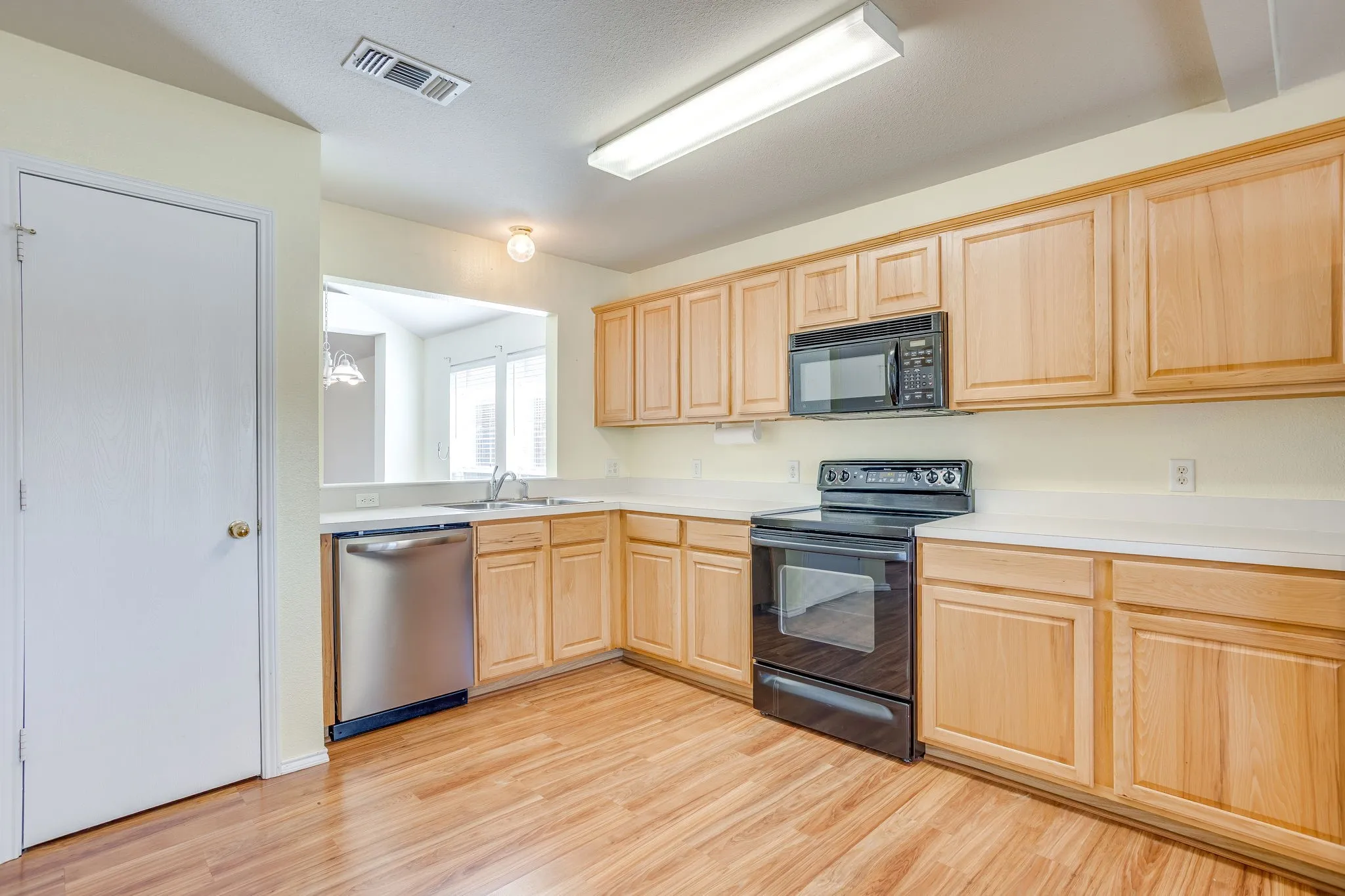 Pantry, electric oven, microwave and dishwasher