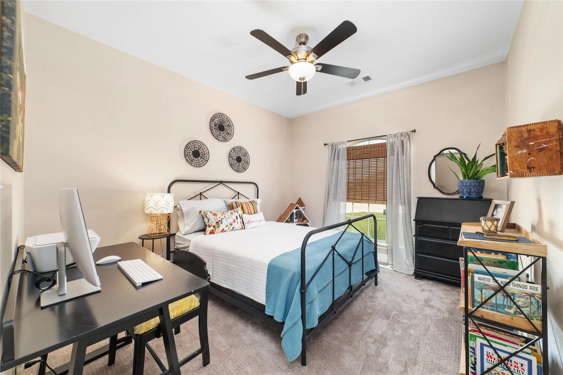 Bedroom with ceiling fan and carpet flooring