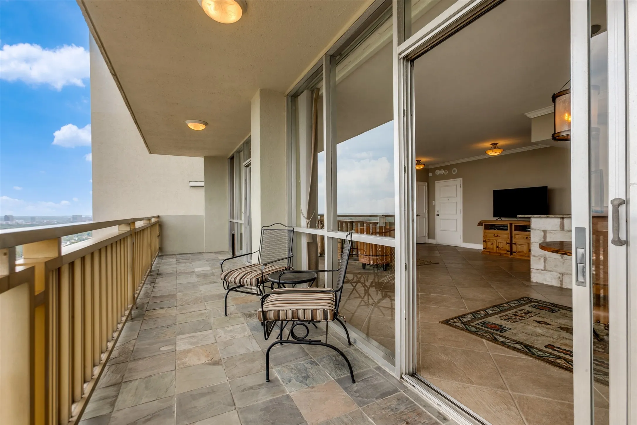Balcony has access from living and dining areas