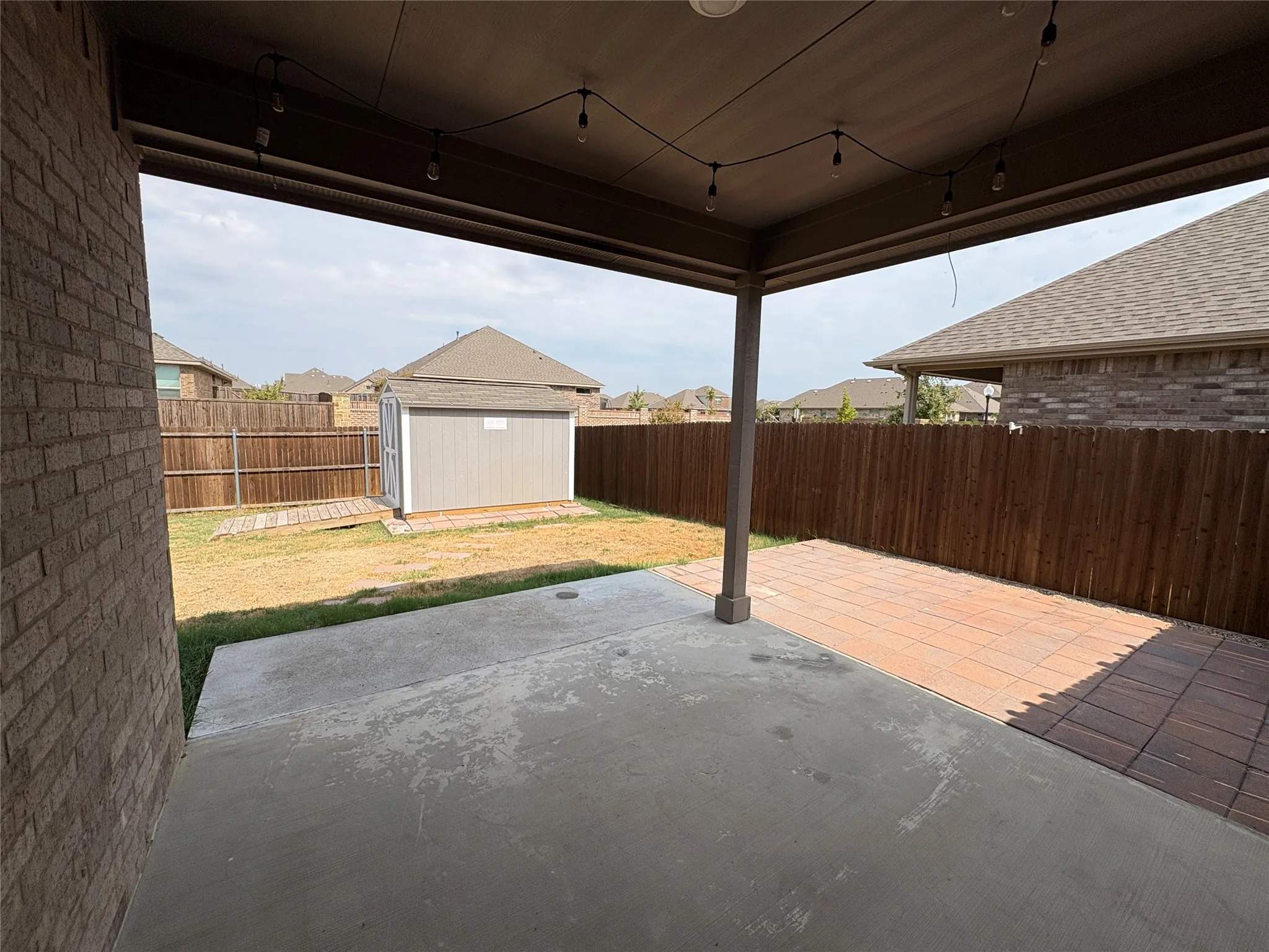 Large Covered Patio and Fenced backyard, shed